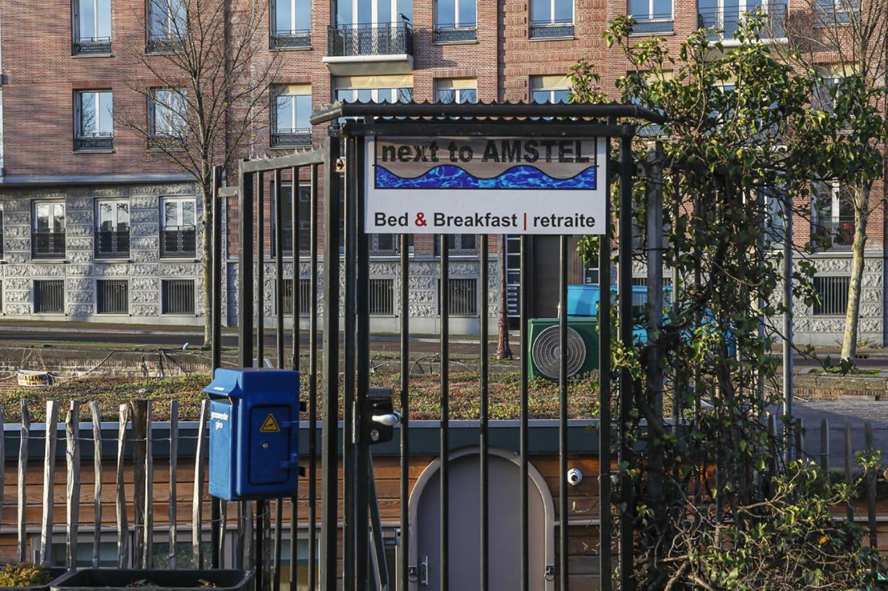 Houseboat Next To Amstel Bed & Breakfast Amsterdam Bagian luar foto