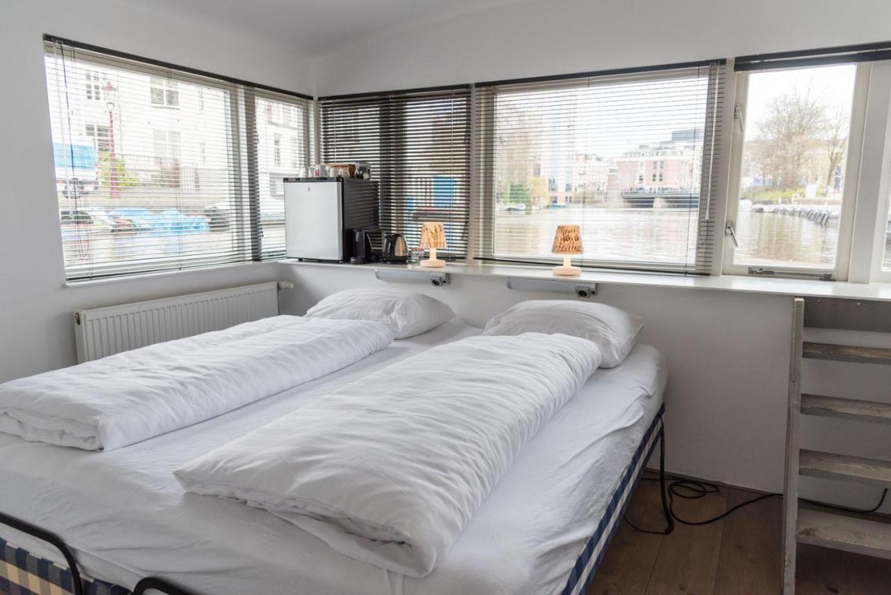 Houseboat Next To Amstel Bed & Breakfast Amsterdam Bagian luar foto